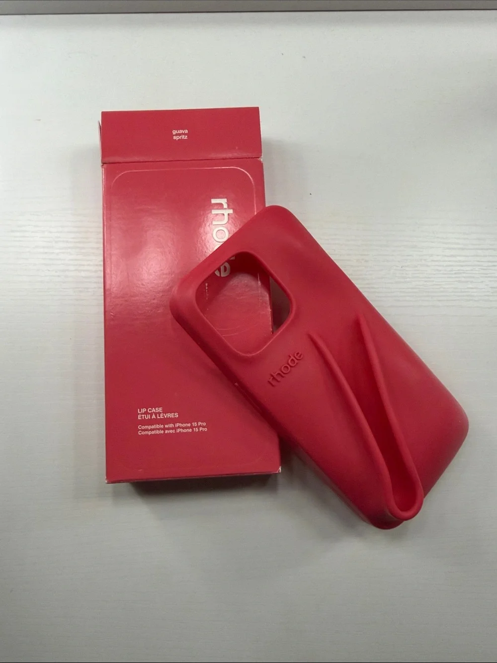 RHODE Guava Spritz Silicone iPhone Case with Lip Tint Holder. Lip tint not inc.